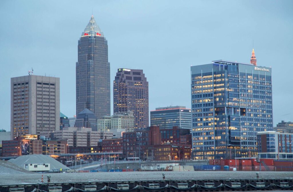 pexels-photo-18353982-18353982 Captivating view of Cleveland's downtown skyline showcasing modern architecture and illuminated buildings.